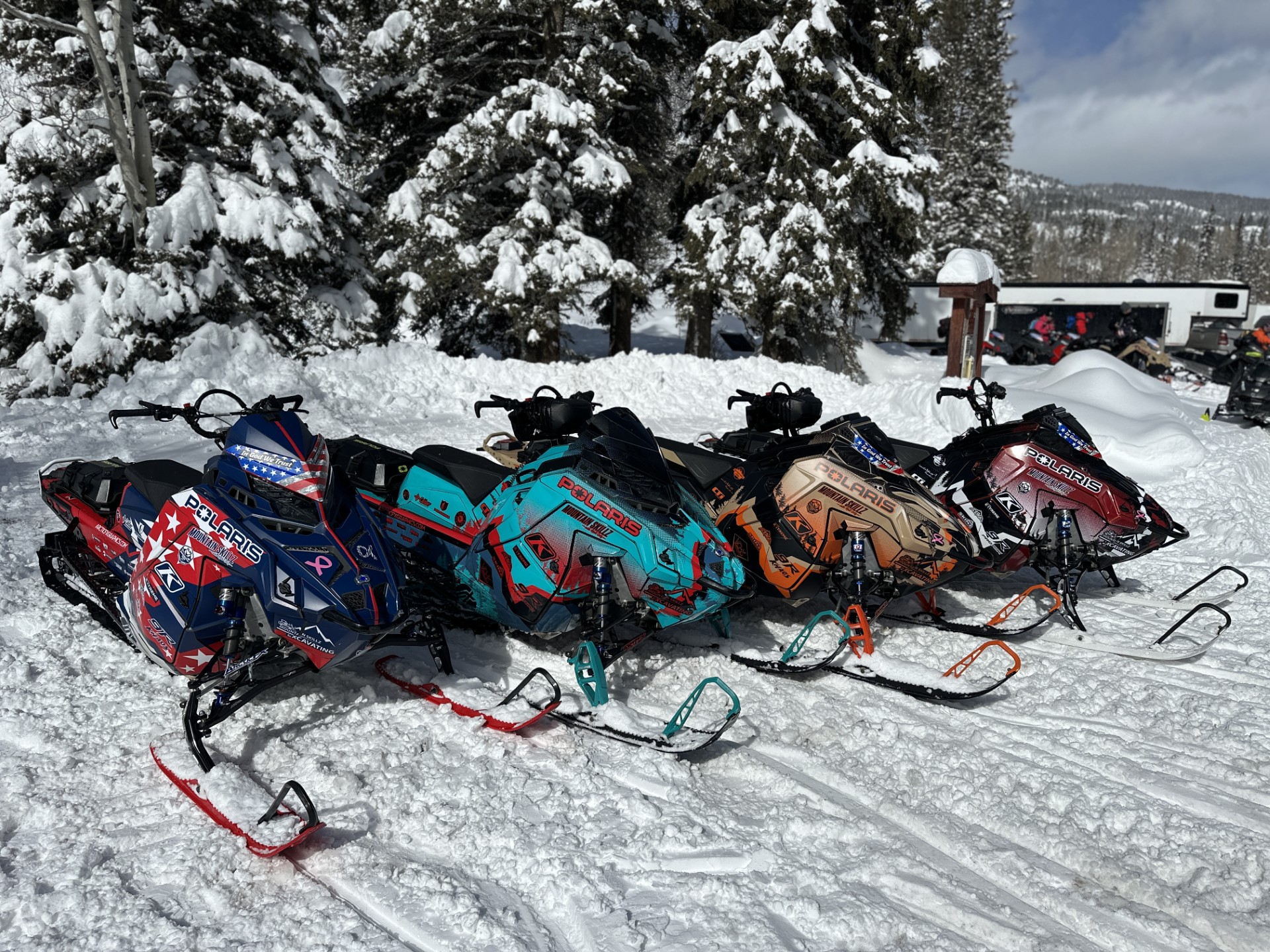 Polaris Matryx Mountain snowmobiles with custom vinyl wraps.