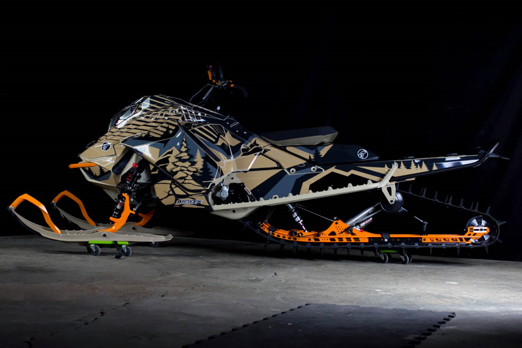 A Ski-Doo Gen4 Lightweight snowmobile with a gray, aqua, and black Leif Alvarsson Kingdom custom vinyl wrap.