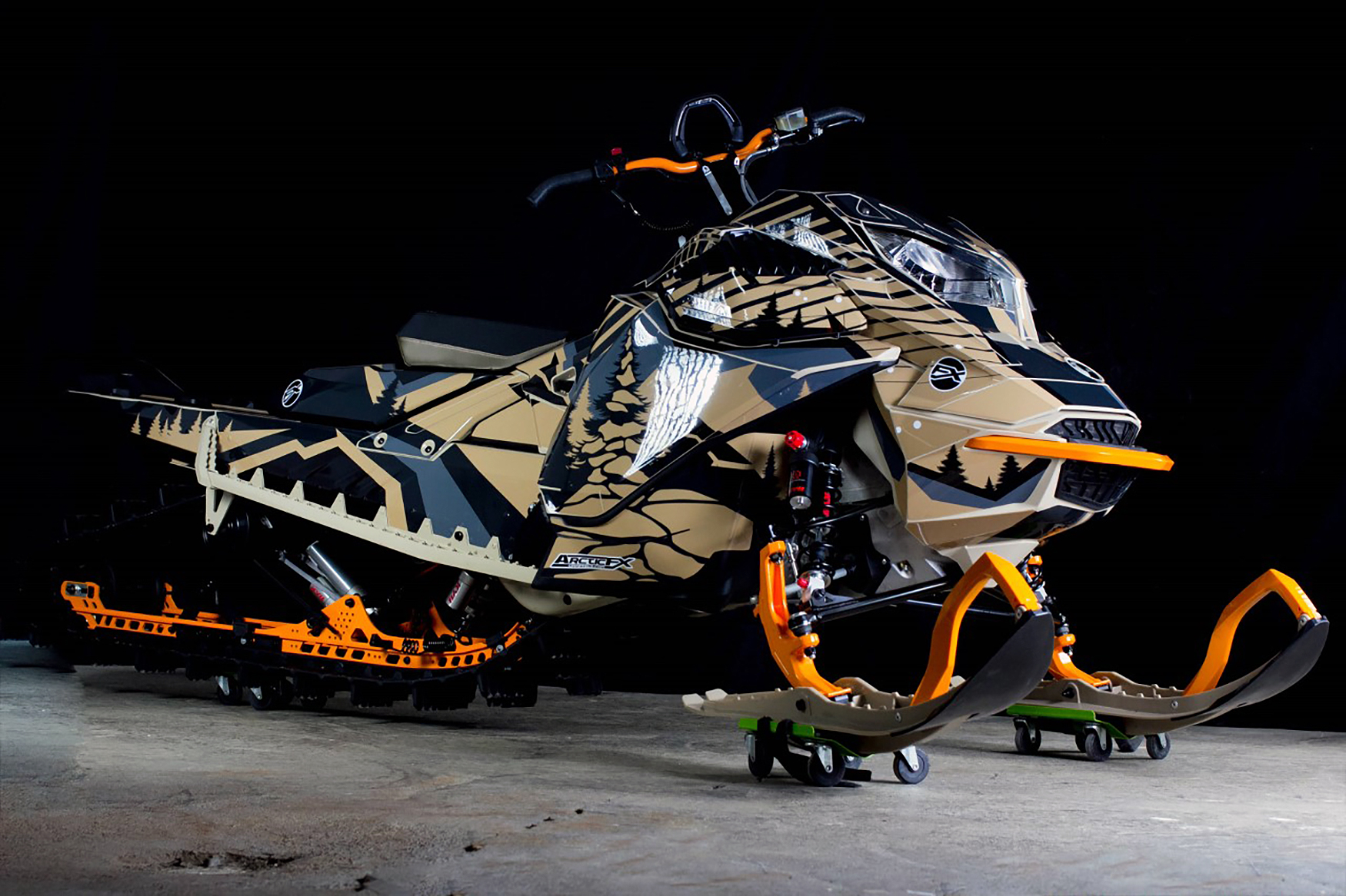 A Ski-Doo Gen4 Lightweight snowmobile with a gray, aqua, and black Leif Alvarsson Kingdom custom vinyl wrap.