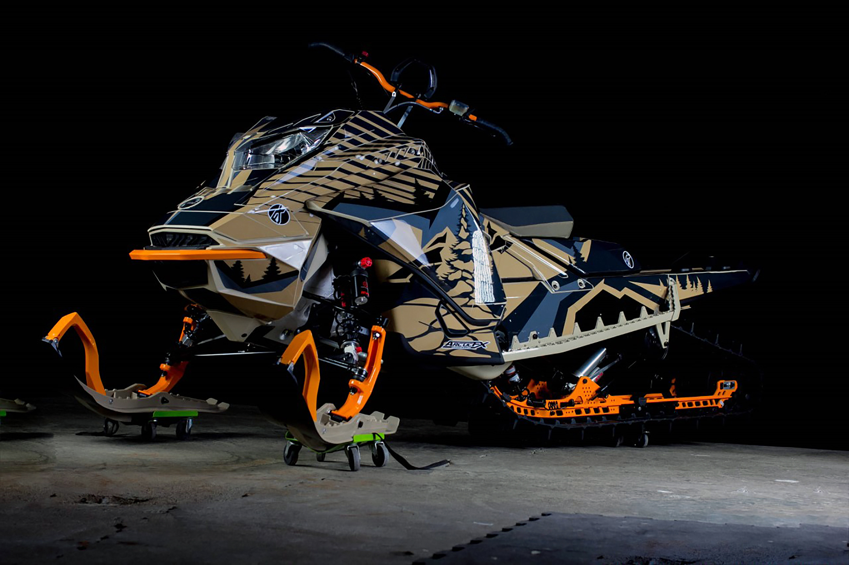 A Ski-Doo Gen4 Lightweight snowmobile with a gray, aqua, and black Leif Alvarsson Kingdom custom vinyl wrap.